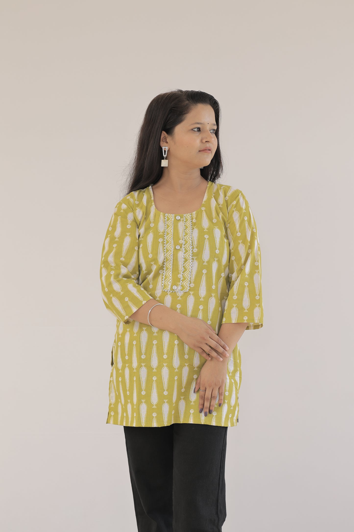 Bright Yellow Casual Kurti with Elegant Patterns"