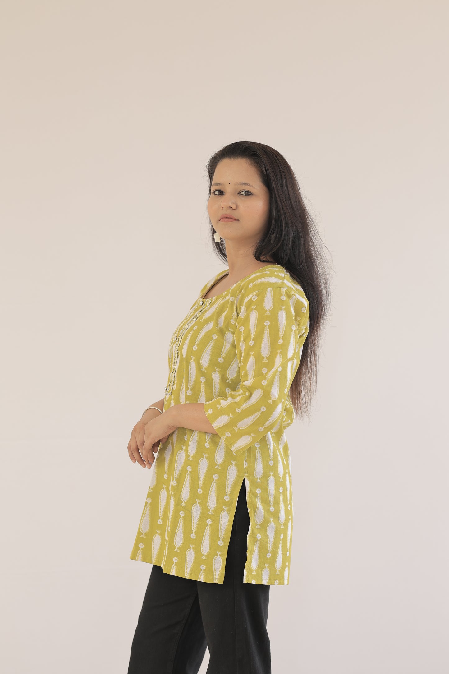 Bright Yellow Casual Kurti with Elegant Patterns"